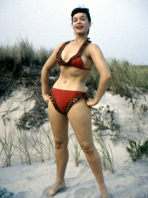 thequeenofpinup:   If my photographs speak to you, then I am happy. If I am remembered today, it is because you see something in me that I never saw in myself.  -Bettie Page  Bettie photographed in color by Art Amsie