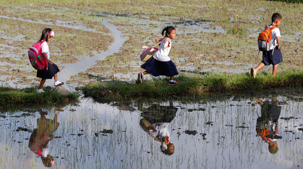 theweekmagazine:  Back to school, in any way possible Around the world, children