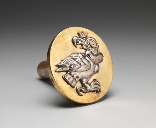 tlatollotl:Earflare, CondorSilver, gold, gilded copper, shellPeru. Moche. 390 to 450 ADMoche metalwo