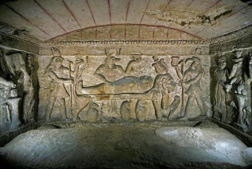 egypt-museum:Catacombs of Kom El ShoqafaRelief depicting Anubis as a Roman legionary preparing the m