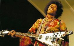 lastdamndinosaur:Jimi Hendrix plays his hand