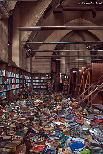 bookporn:  copperbadge:  kingsgrave:  bookporn:  Abandoned: Mark Twain Branch Detroit Public Library by Brandon P. Davis Flickr | Tumblr | Facebook  This is the way the world ends…  I always figured if the apocalypse does come, I’m heading for the