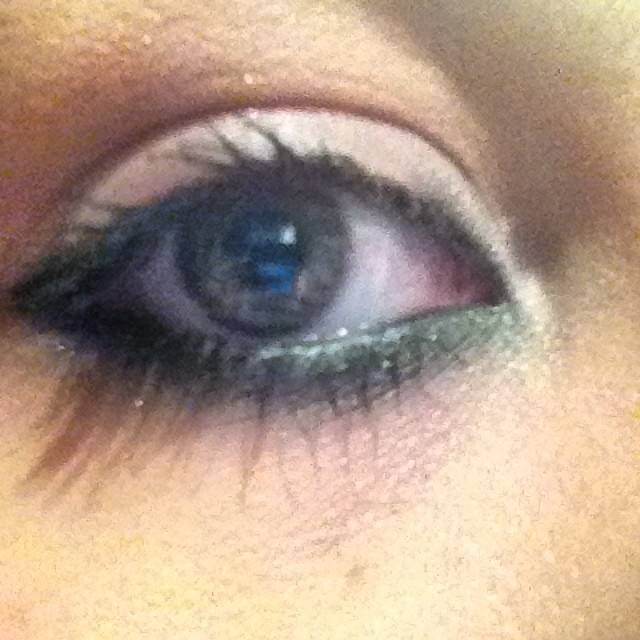 Because I have green eyes, when I want them to look brown I put a bit of green eye