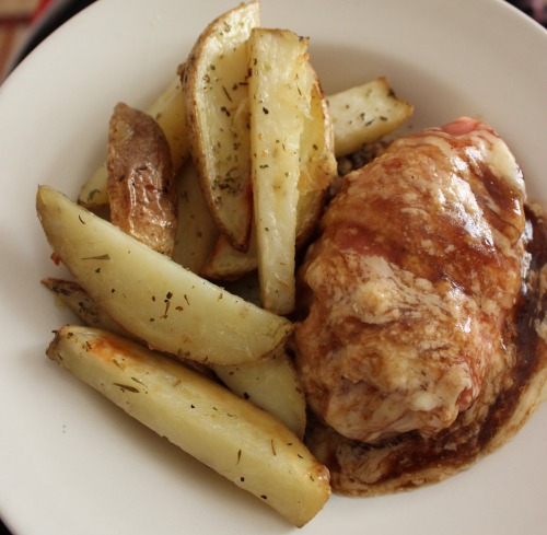 Bacon wrapped chicken in a cheesy bbq sauce &amp; potato wedges