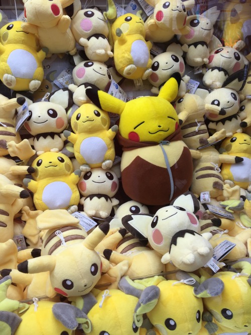 ochazuke-yokochou:Pikachu Eevee sleepbag, Pikachu, Pichu and Raichu plushies at Taito Station Game C