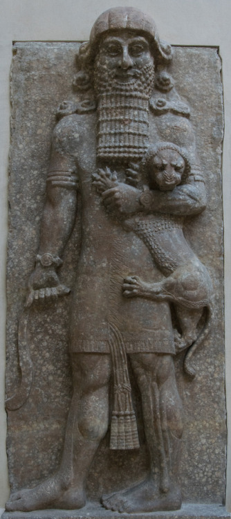 A hero subdues a lion.  Relief sculpture from Wall M of the entrance court of the palace of Sargon I