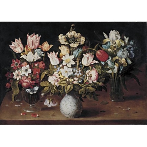 Osias Beert the Elder (Circa 1580 - 1624)Still life of three floral bouquets resting on a table