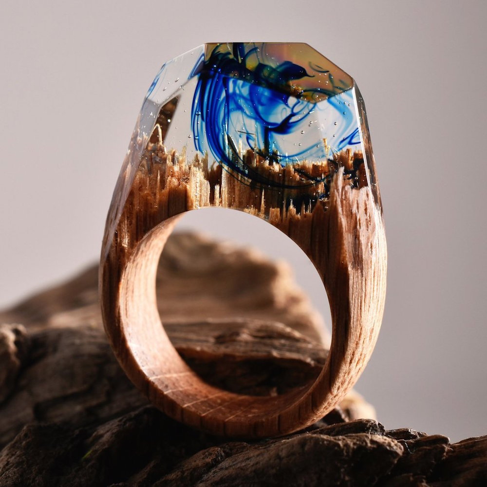 itscolossal:  New Ethereal Worlds Encapsulated In Wood and Resin Rings