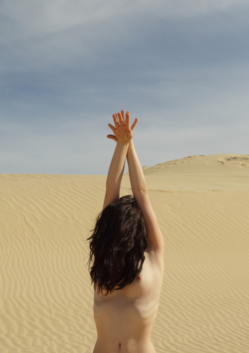 rebeccadimovski:  Enigma. I’ve started noticing two opposites attracting in my works as of recent. The delicate yet graciously constricted female form dancing with how simple and untouched our sacred land is. What i’m essentially doing is forming