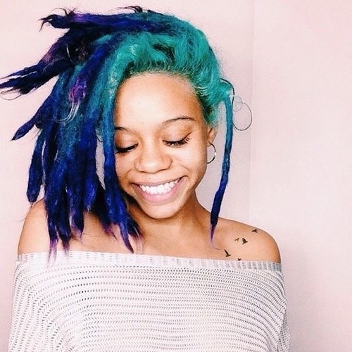 beauteefullblacks:  Carefree black woman with amazing hair color!  Image via We Heart