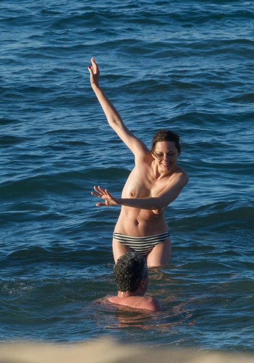 toplessbeachcelebs:  Marion Cotillard (Actress) topless in the Canary Islands (May 2016) Fans of large aerolas are in for a treat! French actress Marion Cotillard was in the Canary Islands shooting her upcoming film Allied with Brad Pitt when she decided