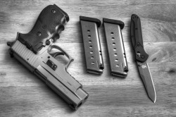 militaryandweapons:  Sig and Benchmade by ZORIN DENU on Flickr. 