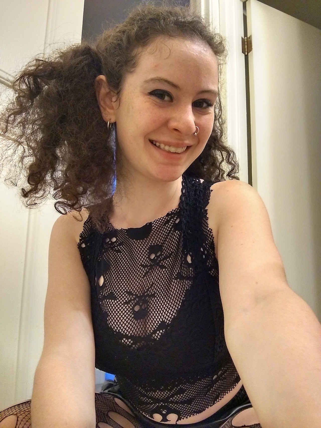 makingoutisgreat:  Frizzy hair and skulls on my chest