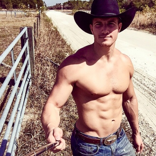 phd-bullrider:  Beware …drive with caution …hottie cowboy fixing his fence along the road!