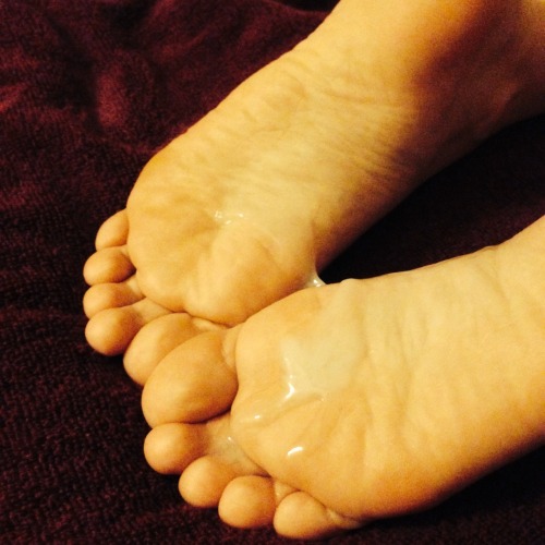 paintedblack71:  My cute cum covered feet!!