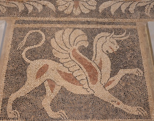 Pebble mosaic floor depicting a griffin, from the Peloponnesian polis of Sicyon.  Artist unknown; 2n
