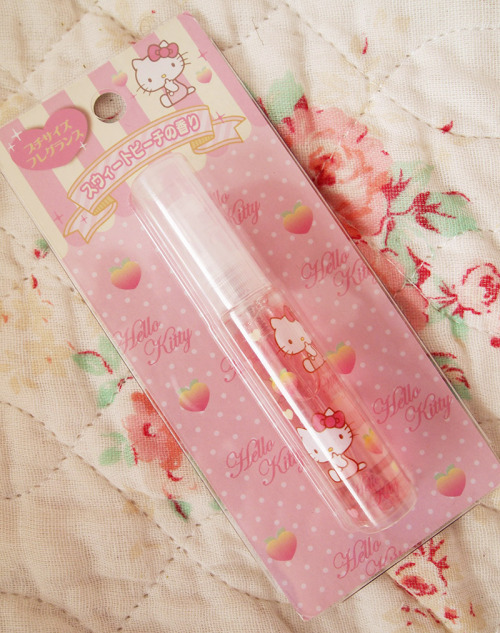 XXX eevee-morgan:  Hello Kitty peach perfume photo