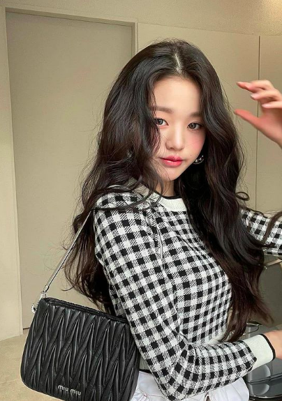 IZONE’s Wonyoung wearing MIU MIU sassy matelassé nappa leather handbag $2,800 AUD for the Miuccia Pr