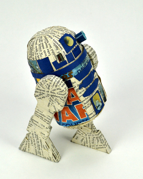 juliancovey:  R2D2Mixed media. All materials taken from book: “Star Wars: The Courtship of Princess Leia”. Collaborative piece constructed in 3 hours.3.75" x 7.5" x 5"2013