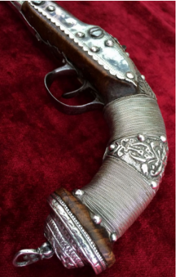 Ornate silver decorated flintlock pistol originating from the Caucuses, early 19th century.from Andr