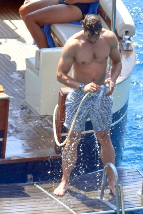 niftyshadesofmelissa:  Jamie Dornan Shows Off His Chiseled Wet Body on boat trip in Capri, Italy 