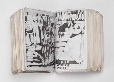 horizontaldrawing:takanori herai. geometric patterns of obscure meaning fill sheets of note paper, a