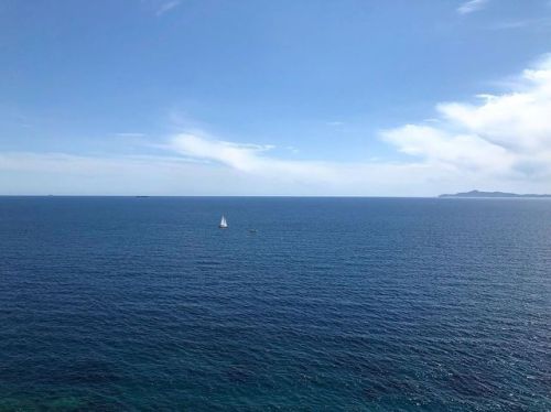 TravelGram: infinite blue • • • • • • Tags: #athens #sounio #easter #sea #cliff #sky #clouds #boat #