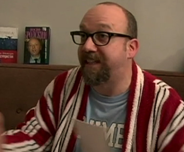The rare sight of a Giamatti grin makes everyone happy.  This is a screen shot from a movie whose na