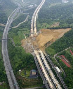 sixpenceee:  This landslide covered the National Highway in North Taiwan. Facebook | Instagram | Scary Story Website