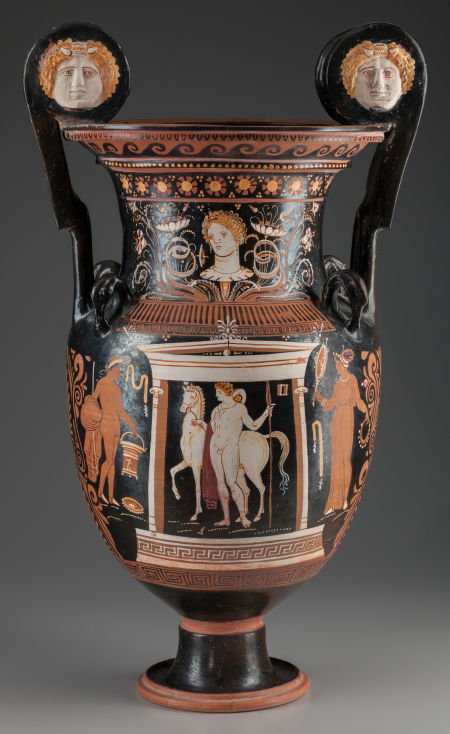 ganymedesrocks:  AN APULIAN RED-FIGURED VOLUTE-KRATER circa 340-320 B.C.. The Krater, attributed to the Group of Copenhagen 4223 obverse with a nude youth and horse within an Ionic naiskos, both in added white, the youth holding a spear and the horse’s