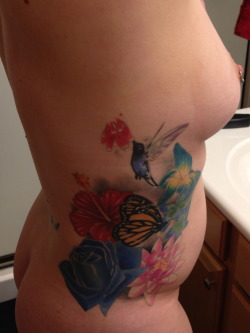 leatherlaceandsex:  Wordsmatty: My wife’s side done by the same artist that is doing my back. Beautiful!! 