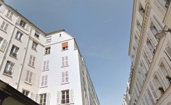 kooksarecool:  apartment with orange blinds in paris