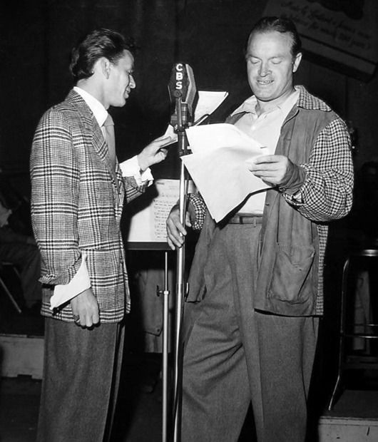 foreverfranksinatra:  Frank Sinatra and Bob Hope photographed during a radio broadcast.