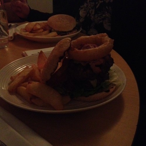 Mammoth burger my brother and dad tackled tonight. Eat big or go home! #rarecow #family #food