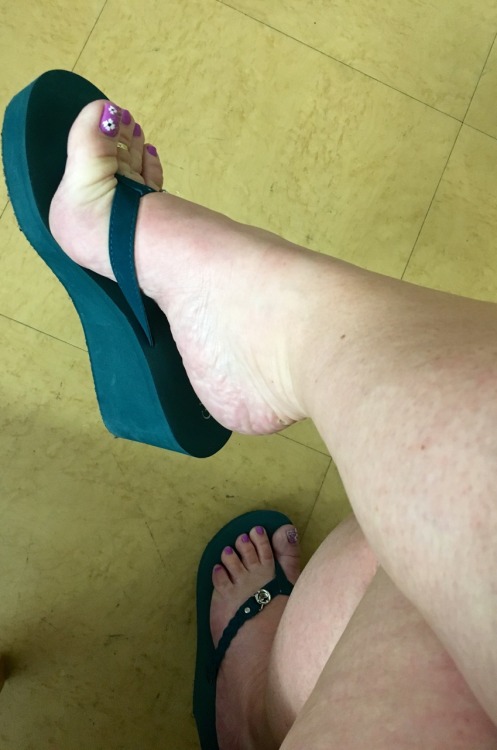 prettylilredhead: Mani/Pedi pics… Work edition  Purple this time with pretty flowers! Wearing teal G