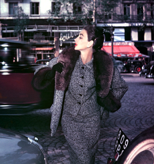 Dorian Leigh; on the Avenue des Champs-Élysées, Paris; photo for Elle by George Dambier, 1953.