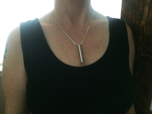 The key to my cuck’s chastity device. I love the look of the necklace and don’t want to take it off. So, tough, he’s not getting out.