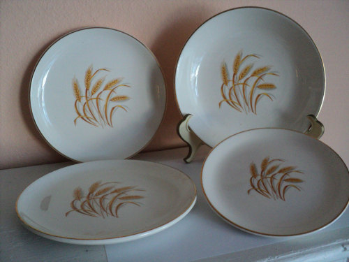 Brown with gold trim saucer