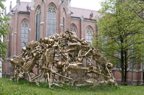 thefabulousweirdtrotters:  Skeletal Jungle Gym in the backyard of the church Heilig-Kreuz Kirche in Munich, Germany. Art by Peter Ris Facebook | Google + 