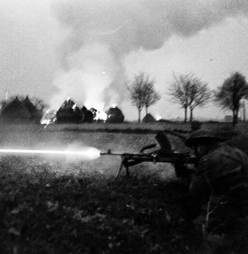 Parachute Regiment Gunner Firing A Bren From A Ditch During Operation Market Garden, Sept 1944