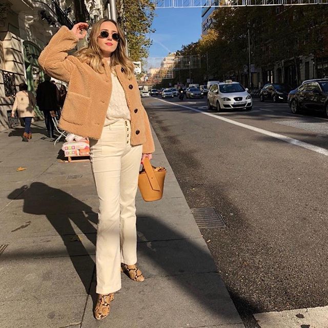 French Girl Daily — brown teddy coat, cream pants, snakeskin boots