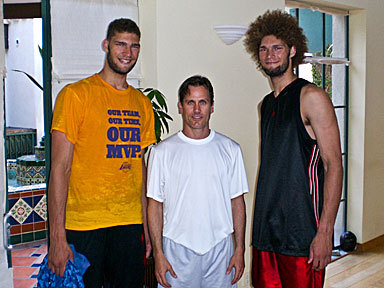 intrigueindy:  7'1&quot; twins Brook and Robin Lopez with their size 20’s