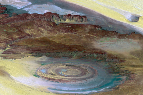 itscarororo:  npr:skunkbear:The Richat Structure or “The Eye of the Sahara” is a mysterious geological formation in Mauritania. Scientists used to think it was the site of a meteor impact or volcanic eruption. Now, the leading theory is that a symmetrical