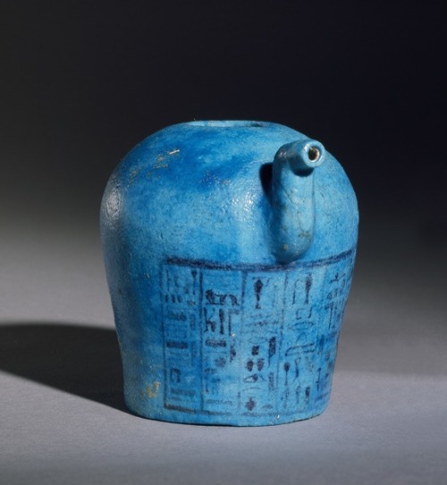 Ushabti and Libation Vessel inscribed with hieroglyphs (glazed faience earthenware), from the Tomb o