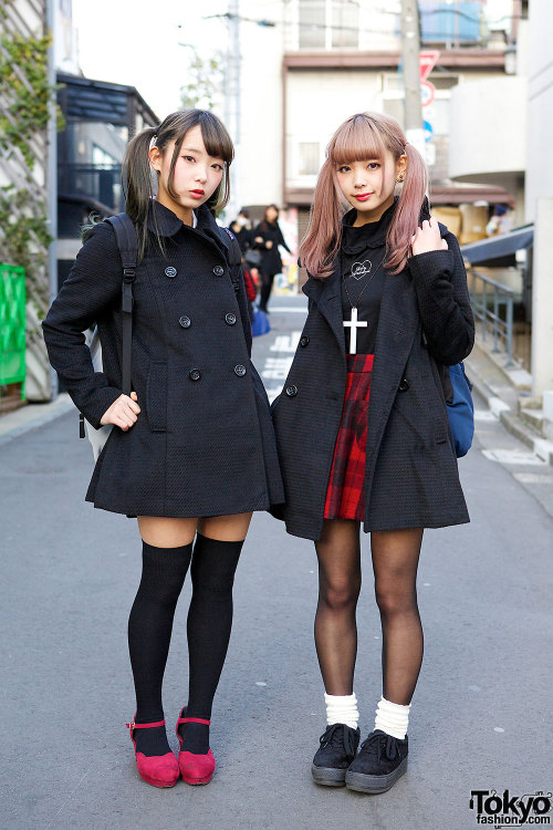 Twin Japanese sisters Mim (right, pink hair) and Mam (left, darker hair) on the street in Harajuku w