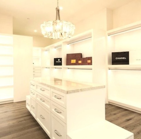 Traditional Closet Los AngelesLarge Traditional Walk-in Closet Idea With Recessed-panel Cabinets And