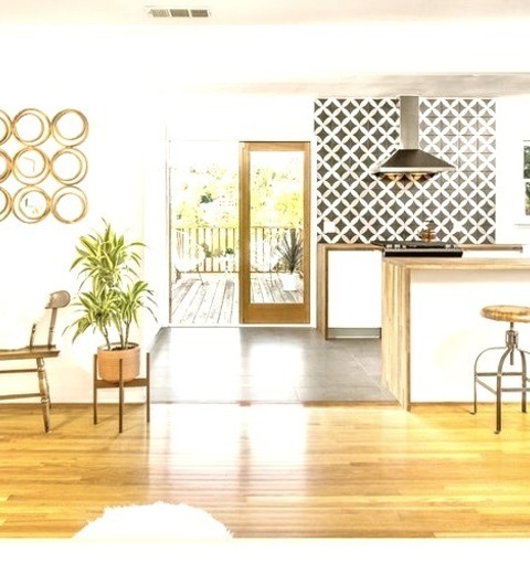 Kitchen In Los AngelesMid-sized Trendy U-shaped Slate Floor Open Concept Kitchen Photo With Wood Countertops,