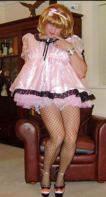 satin-spanks-and-frills:In just a few moments sissy will be bent over that armchair