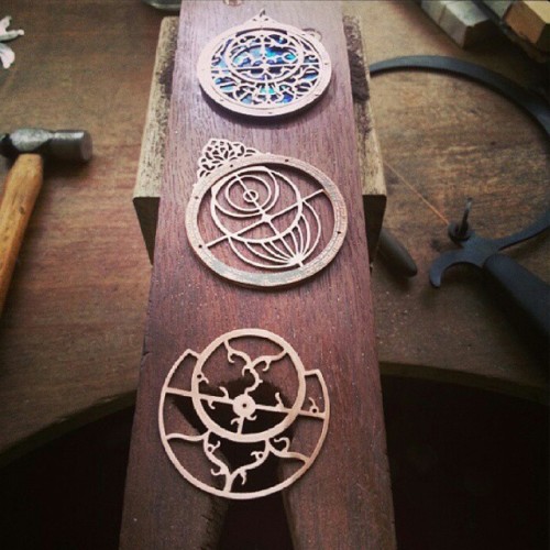 jeanburgers:Working on some Astrolabe Pendants - handcut copper and paua shell.3 days left to enter 