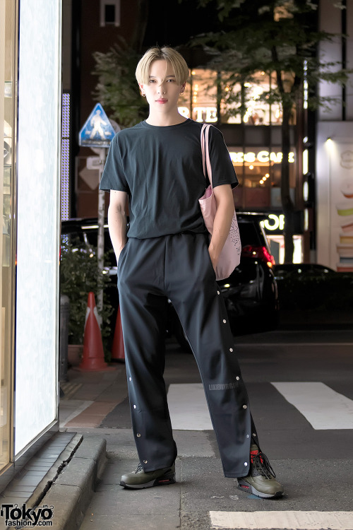 Japanese style icon Naopis on the street in Harajuku after dark wearing an Olive and Frank &ldquo;Ba